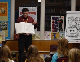 Author speaking to students